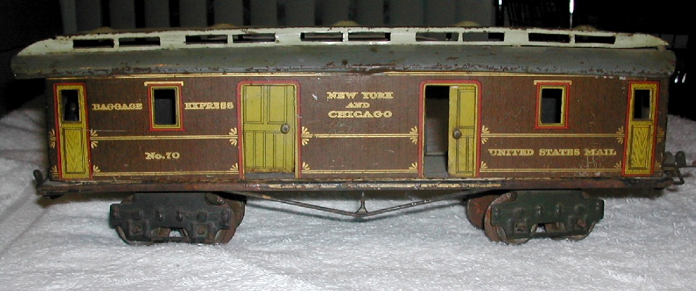 1 gauge baggage on O gauge trucks